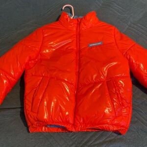 orange members only jacket, bought it 2 years ago. i can no longer fit, size s .